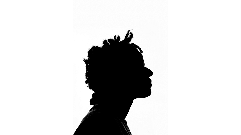 Black silhouette of man for Black identity in the UK